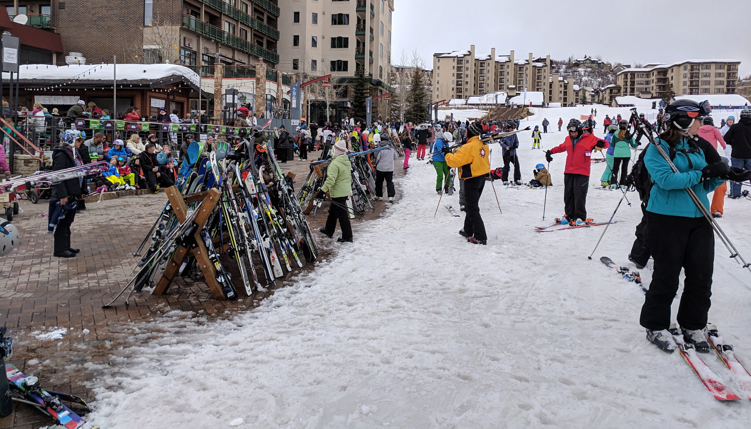 the promenade during the ski season, the snow fully covers Burgess Creek and people ski on top